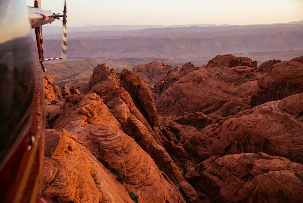Aerial view from a helicopter over the fiery red rock formations of Valley of Fire