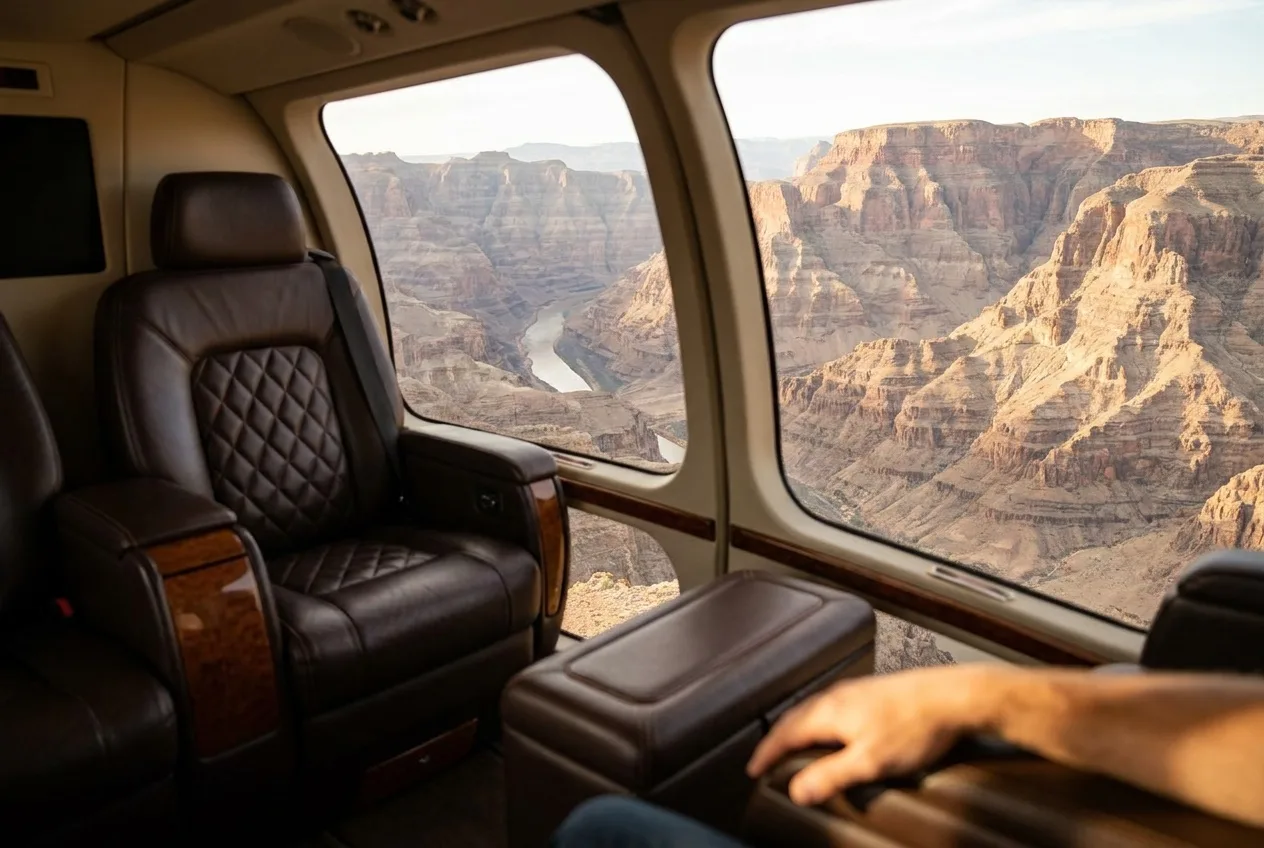 A luxury helicopter cabin with leather seats and panoramic windows over Grand Canyon West